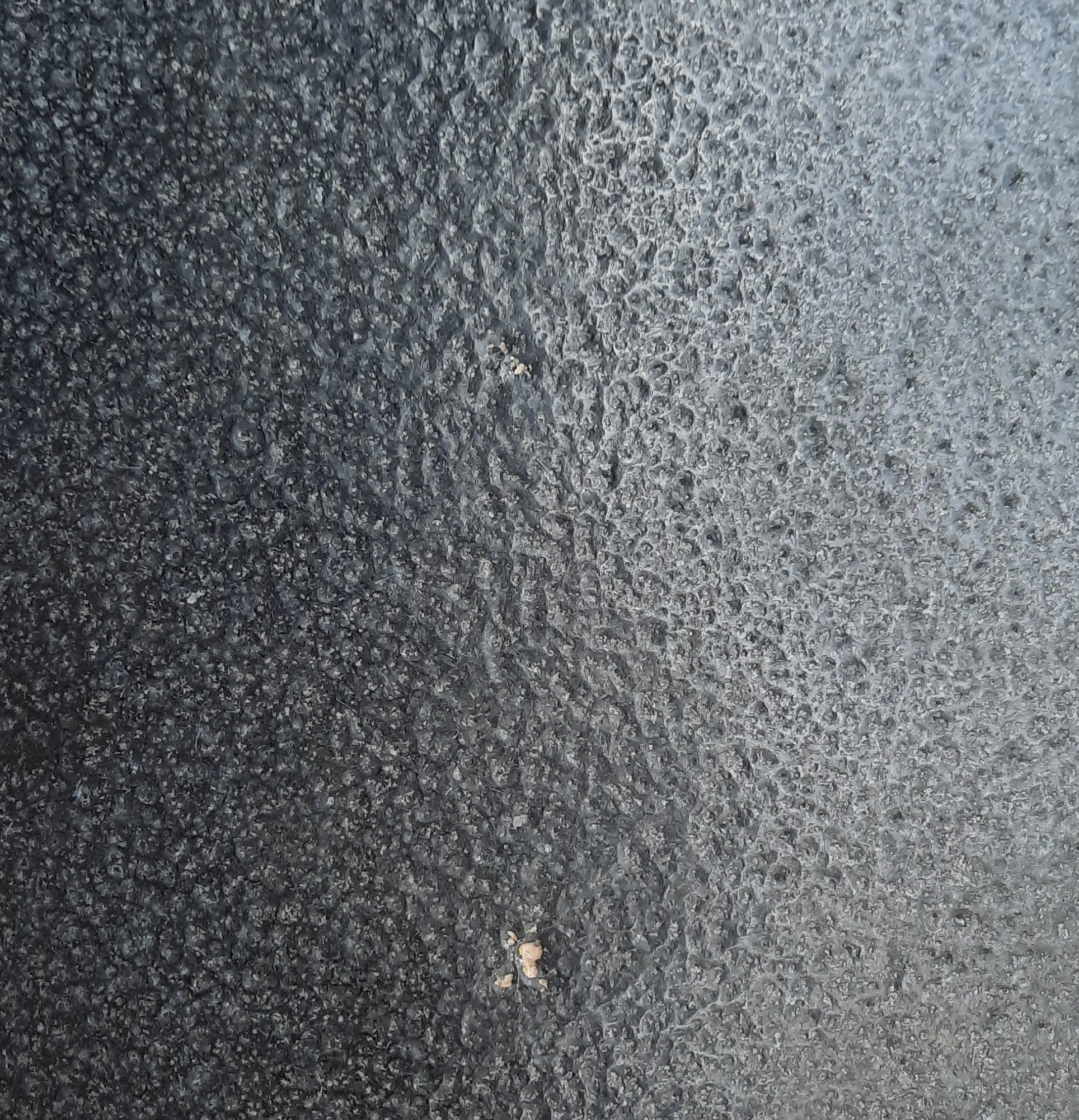 Leather-finish Indian Black Granite texture reference